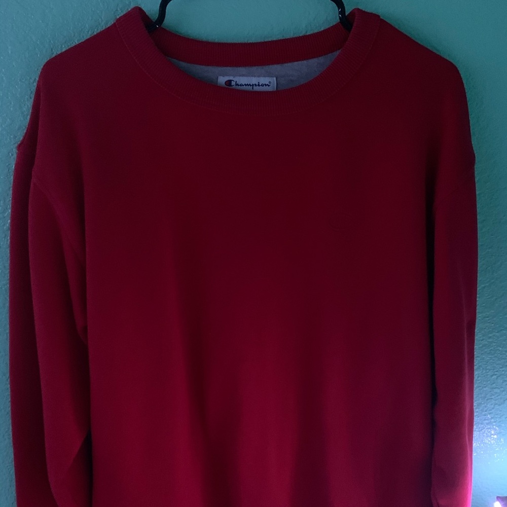 A red champion sweatshirt